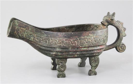 A Chinese archaic bronze ritual pouring vessel, Yi, possibly Western Zhou dynasty, 9th-8th century B.C., 28cm long